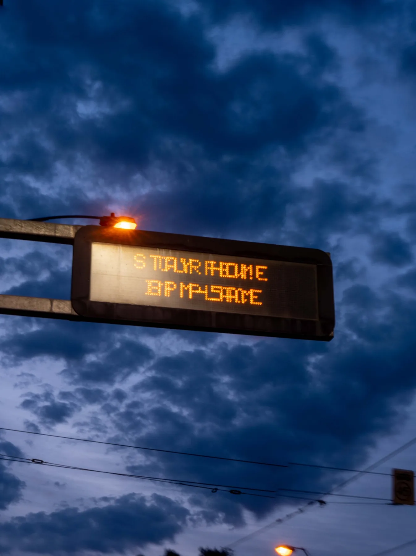 Storm sign under blue sky